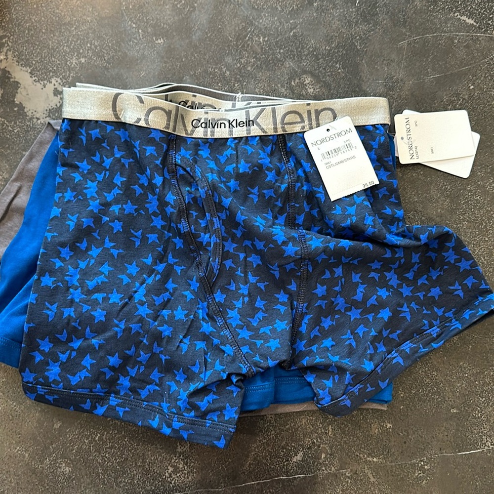 New with tags boys Calvin Klein three pack boxer briefs, size Large 12/14